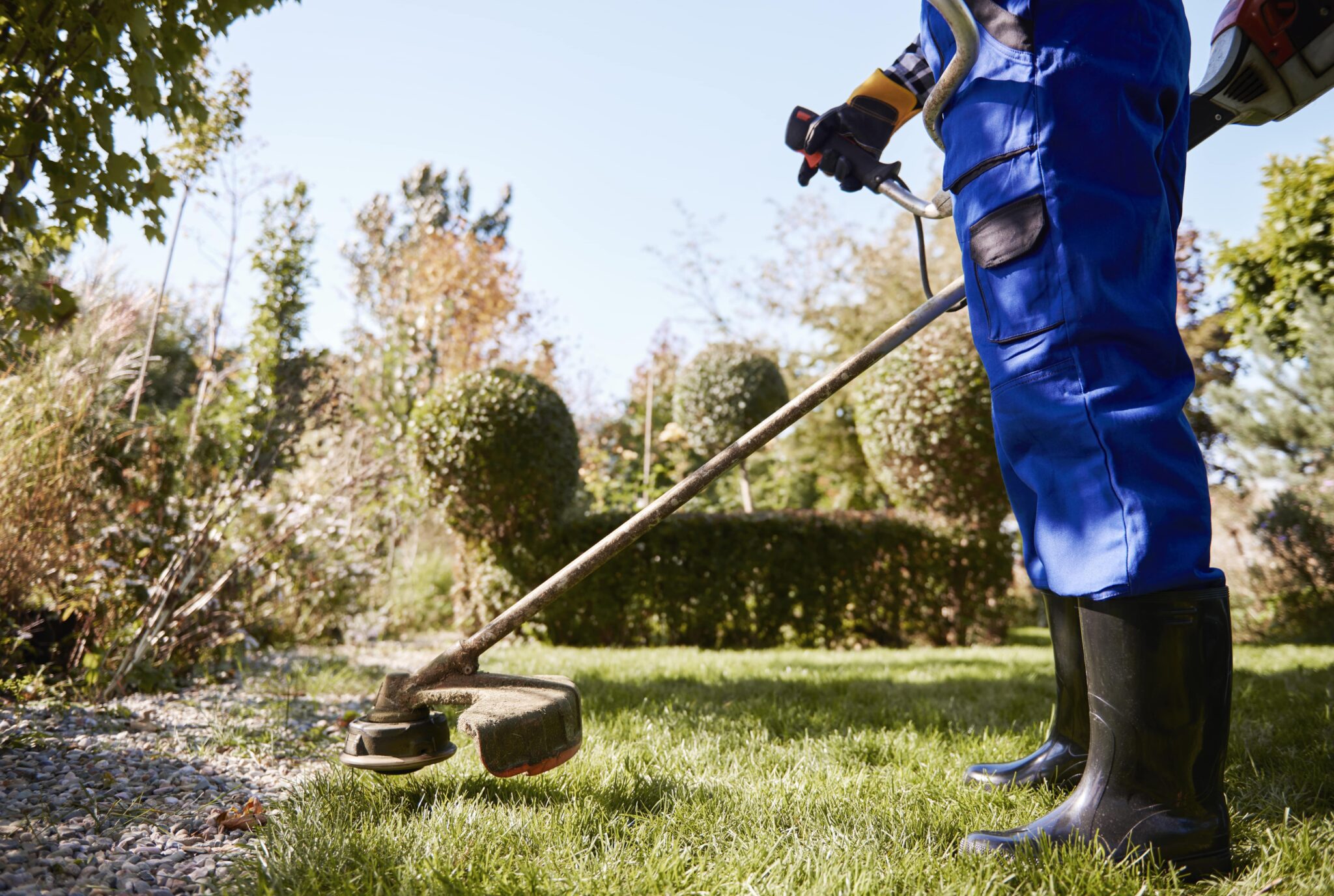 gardener-with-weedwacker